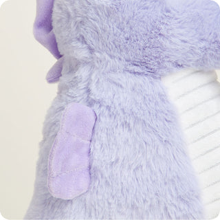 Seahorse Warmies
Close-up of a fluffy lavender blanket with a white bottle underneath on a light background