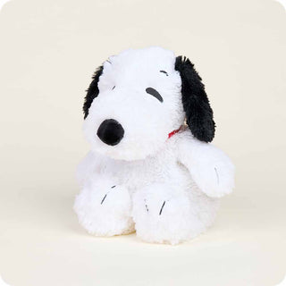 Snoopy Warmies
Plush toy resembling a dog with black ears and nose on a beige background