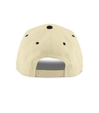 Dad Brand Dad snapback hat in cream with black brim, showing the front panel and adjustable back strap.