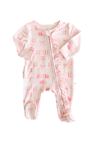 Caden Lane Ruffle Zipper Footie - Little Sis Bows
Baby onesie with 'little sis' text and pink designs on a white background