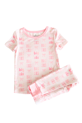 Caden Lane Two Piece Pajama Set - Big Sis Bows
Pink pajama set with 'BFF' and butterfly pattern on a white background