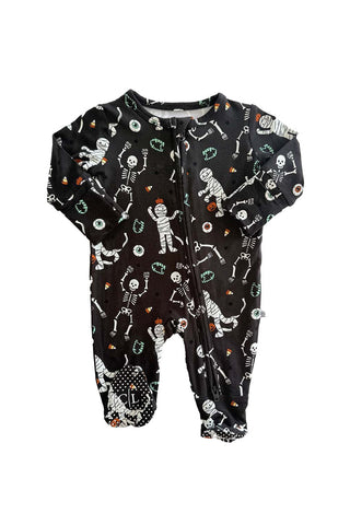 Caden Lane Zipper Footie - Glow in the Dark Eye Want Candy A baby footed sleeper in black with a white skeleton and mummy print, featuring a front zipper closure.