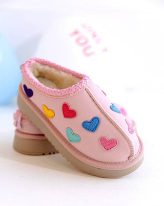 Lola and The Boys Candy Heart Sherpa Booties
Pink children's shoes with colorful heart designs on a white background