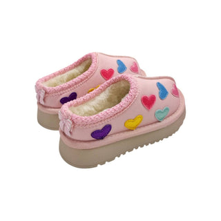 Lola and The Boys Candy Heart Sherpa Booties
Pink children's shoes with colorful heart patterns on a white background