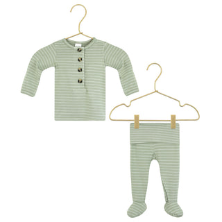 Lou Lou and Company Knit Top and Bottoms - Carson
Green striped baby outfit with shirt and pants on hangers against a white background