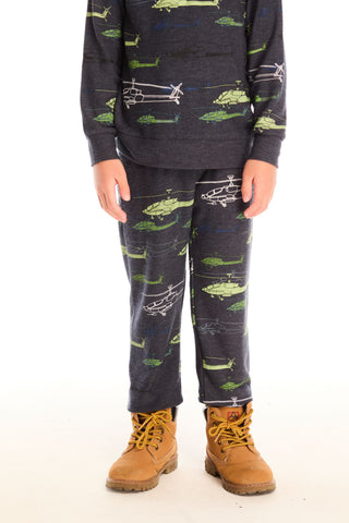 Chaser Allover Helicopters Pants 
Child wearing a dark gray pajama set with green and white patterns on a white background