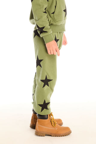 Chaser Allover Stars Green Pants
Green outfit with star patterns worn by a person on a white background