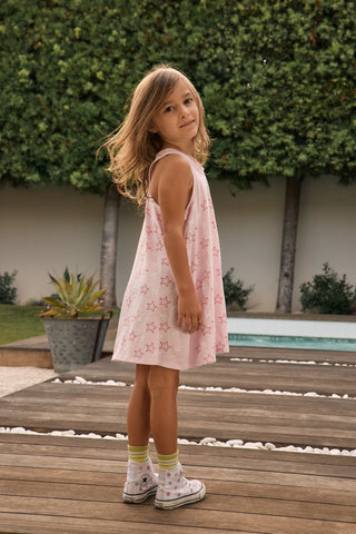 Kids' Chaser Bows and Stars Dress featuring a colorful bow and star print, perfect for playful and stylish occasions.