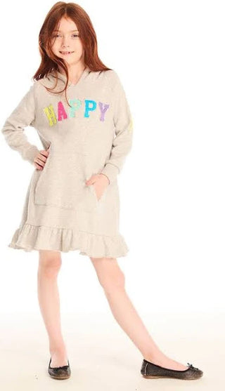 Chaser Chaser Glitter Smiley Hoodie Dress
Child wearing a beige dress with colorful letters on a white background
