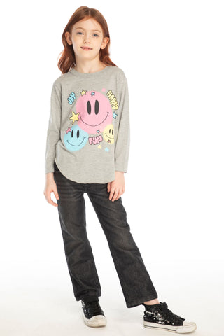Chaser Colorful Smileys Long Sleeve
Girl wearing a gray sweater with colorful smiley face designs on a white background