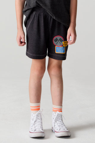 Chaser Race Patches Shorts in black with colorful patch details, casual athletic fit, front and back view.
