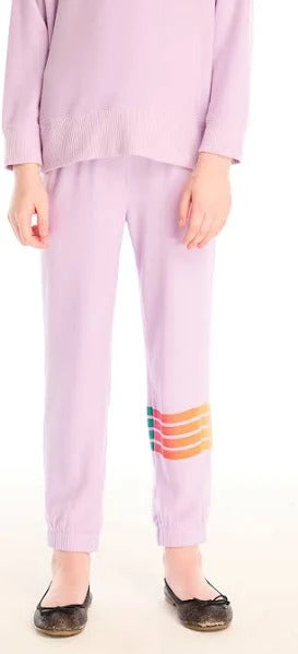 Chaser Rainbow Glitter Pants
Person wearing light purple pants with a colorful stripe design on a white background