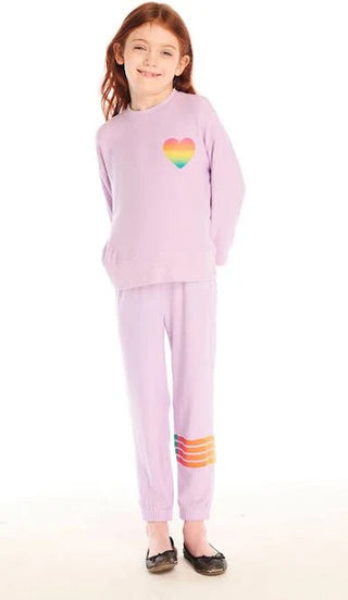 Chaser Rainbow Glitter Pants
Child wearing a pink outfit with rainbow designs on a white background