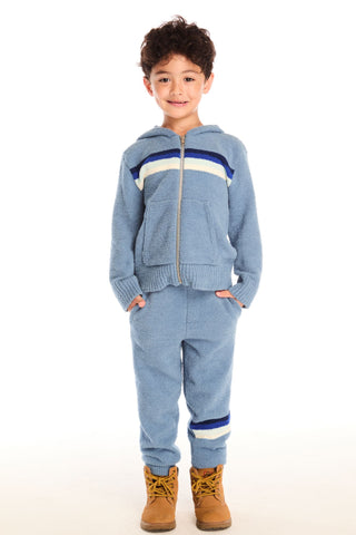 Chaser Tahoe Blue Lounge Pant With Pocket
Child wearing a blue tracksuit with white stripes on a white background