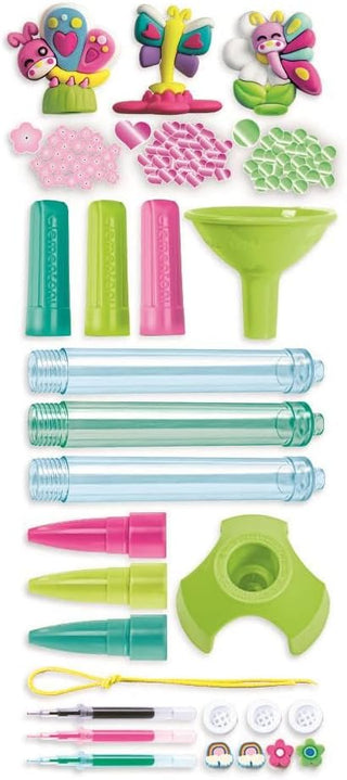 Clementoni Idea Create Your­ Pens Wonderful Butterflies 
A colorful craft and science experiment kit with various plastic tools, including test tubes, funnels, markers, butterfly and flower-shaped items, and small accessories, arranged on a plain white background.