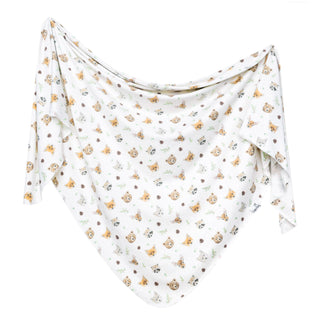 Copper Pearl Wilder Swaddle Blanket
Baby blanket with teddy bear pattern on a white background