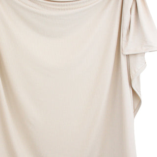 Lou Lou and Company Ribbed Swaddle Blanket - Cove
Close-up of a beige ribbed t-shirt on a white background