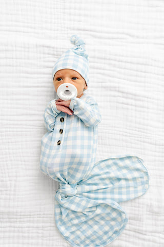 Lou Lou and Company knit knotted gown for infants, soft fabric, with a cozy design perfect for baby wear.