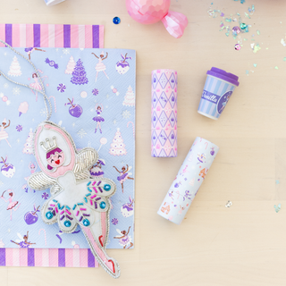 Jollity & Co Daydream Society Sugarplum Lip Balm Set with five gingerbread house-shaped lip balms in festive packaging