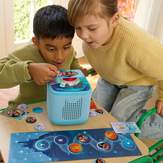 Disney Quiz Kingdom Tonieplay Controller + Game Set
Two children playing with a toy on a table