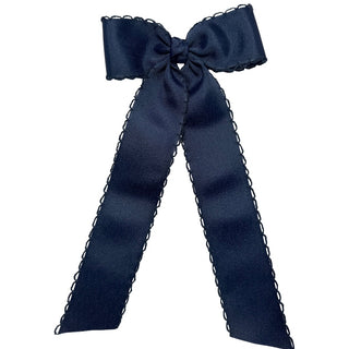 Navy Blue Wee Ones Medium Moonstitch Grosgrain Streamer Hair Bow on Clippie
Navy blue bow with decorative trim on a white background