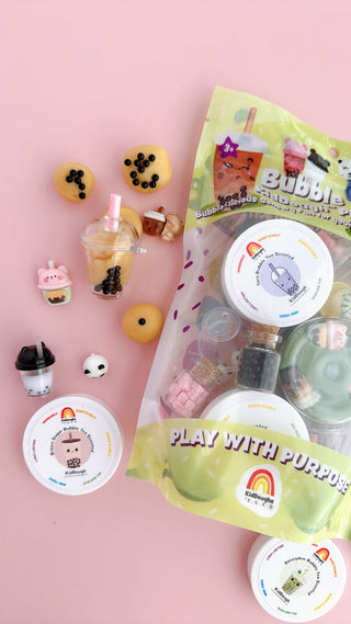 EGKD Earth Grown KidDoughs Bubble Tea KidDough Play Kit  
Set of bubble tea-themed toys and packaging on a pink background