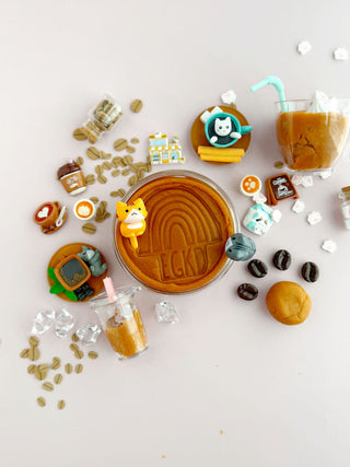 EGKD Earth Grown KidDoughs Cat Cafe KidDough Play Kit
Collection of coffee-themed figurines and decorations on a light background