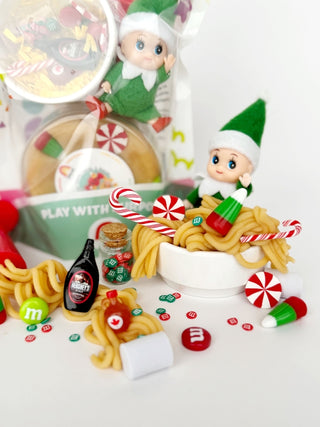 EGKD Earth Grown KidDoughs Elf Breakfast KidDough Play Kit
Christmas-themed playset with elves, candy canes, and M&M's on a white surface.