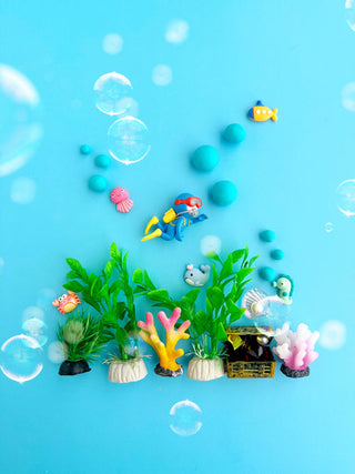 EGKD Earth Grown KidDoughs Ocean Explorer KidDough Play Kit  
Colorful aquarium toys with plants and fish on a blue background