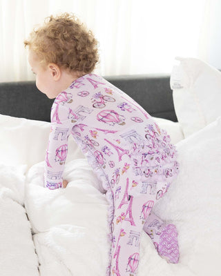 Lev Baby Emilia ruffled zippered footie, soft infant onesie with ruffle details and front zipper for easy dressing.