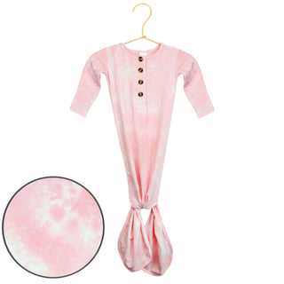 Lou Lou and Company Knotted Gown - Emily
Pink tie-dye baby onesie on a hanger with a close-up of the fabric texture.