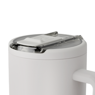 Close-up of the Brumate Era Flip 40oz cup in Dune color with its flip lid open, showing the durable design and brand logo.