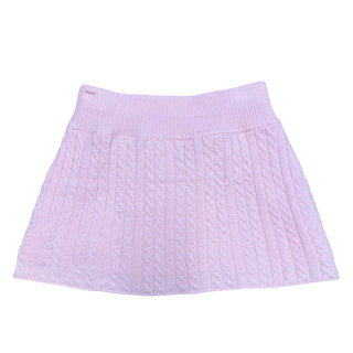 Light pink cable knit skirt by Flowers By Zoe, featuring a cozy, textured design and a classic, feminine silhouette.