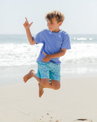 Feather 4 Arrow Sandy Shores swim trunks with a lightweight, quick-drying fabric and a stylish, casual beachwear design.