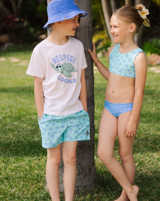 Feather 4 Arrow Aqua Crystal reversible bikini swimwear with a vibrant summer sun pattern, featuring a stylish, colorful design.