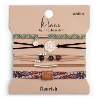 K'lani "Flourish" Natural Butterfly Hair Tie Bracelets
A packaged set of braided and elastic hair ties and bracelets on a beige card labeled 'k'lani hair tie + bracelet' and 'flourish,' with the size marked 'medium.' The set includes multiple woven and corded bracelets in green, black, tan, patterned tones, and metallic silver details.
