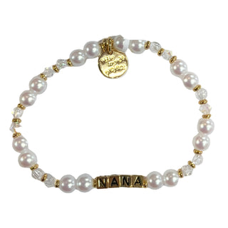 Gold Little Words Project bracelet with "Nana" and "Moonlit Love" engraved, featuring delicate chain and custom charm.