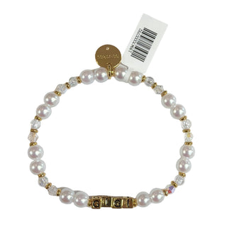 Little Words Project Bracelet - Gold Gigi Custom Moonlit Love
A pearl and crystal beaded stretch bracelet with gold-tone letter beads spelling 'GUCCI' and a round gold-tone logo charm, shown with a white retail tag on a white background.