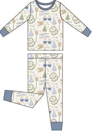 In My Jammers Two Piece Set - Blue Birthday Boy
Children's pajama set with birthday-themed pattern on a white background