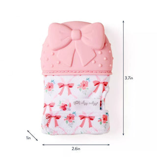 Itzy Ritzy Teething Mitt - Bow
Pink silicone teether with floral design and measurements on a white background