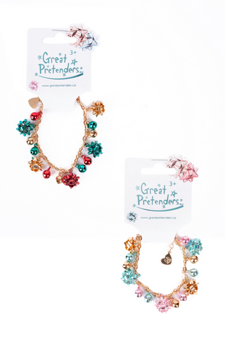 Great Pretenders Jingle All the Way Bracelet
Colorful jewelry set with 'Great Pretenders' branding on a white background