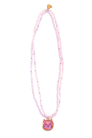 Great Pretenders Konfetti Kitty Necklace
Necklace with pink beaded chain and gold pendant on a white background