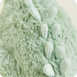 Green Long Neck Dinosaur Warmies
Close-up of green yarn with textured surface