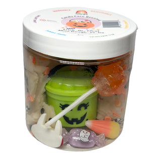 Green Bucket Halloween-themed candy jar with a small green bucket inside, surrounded by candy.