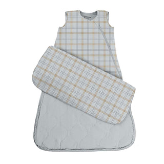 Gunamuna Sleep Sack 1.0 TOG - Plaid
A baby sleep bag with a light gray and white plaid pattern and a solid light gray quilted bottom, shown on a plain white background.
