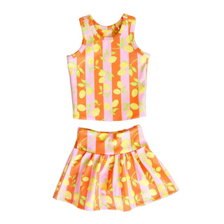 Hollis Baker Sarah Set activewear in pink lemon print, featuring a matching sports bra and leggings on a white background.