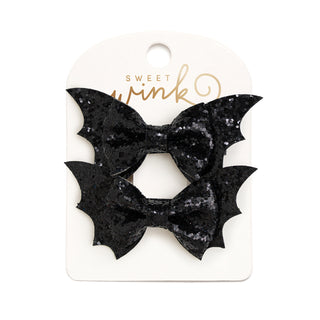Sweet Wink Glitter Bat Halloween Bow Clip Set
Black glittery bow hair clips on a Sweet Wink branded card.