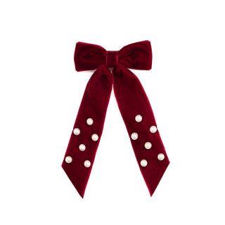 Sweet Wink Ruby Red Velvet Coquette Bow Clip
Red velvet bow with white polka dots on a white background