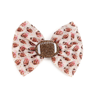 Sweet Wink Football Cutie Tulle Bow Clip Bow tie with football pattern on a white background