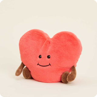 Heart Warmies
Plush heart-shaped toy with a smiley face on a beige background